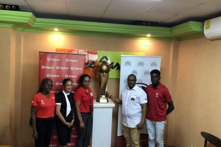 Digicel’s Chief Commercial Officer Simone Pierre (2nd from left), Digicel Communications Manager Vidya Sanichara (3rd from left), and Petra Organization Co-Director Troy Mendonca (2nd from right) displaying the tournament’s lien trophy. Also in the photo are tournament coordinator Lavern Fraser-Thomas (left) and Petra Organization member Mark Alleyne (right)