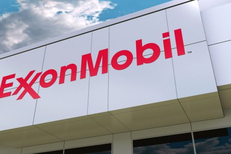 ExxonMobil logo on the modern building facade. Editorial 3D