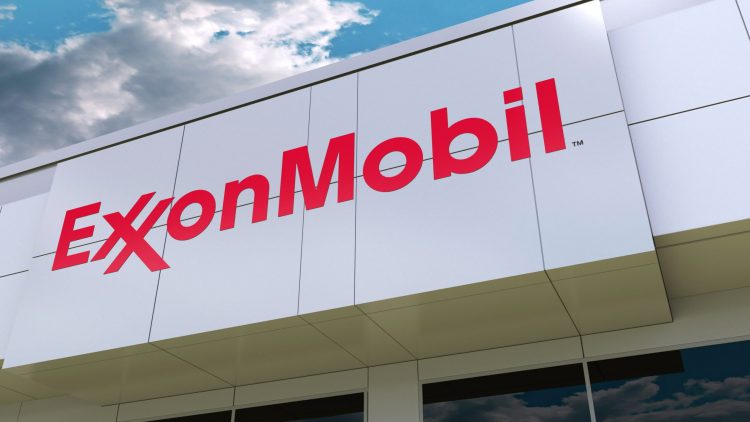 ExxonMobil logo on the modern building facade. Editorial 3D