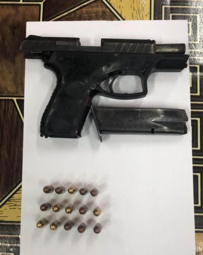 The 9 mm pistol and 15 live 9 mm rounds that were found 
