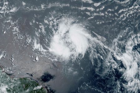 This GeoColor satellite image taken Tuesday and provided by NOAA, shows Tropical Storm Bret as it chugged toward the eastern Caribbean.