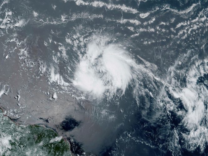 This GeoColor satellite image taken Tuesday and provided by NOAA, shows Tropical Storm Bret as it chugged toward the eastern Caribbean.