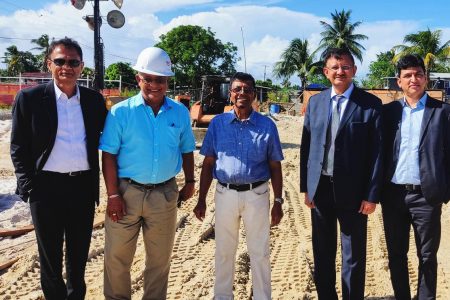 GWI Chief Executive Officer, Shaik Baksh (third from left) and Project Manager, Richard Persaud (second from left) with Toshiba Water Solutions Private Limited Director and Chief Executive Officer, Rajkumar Gupta ((second from right), Group Chief Financial Officer, Anil Chauhan (right) and Group Director, Sanjay Agrawal (left) at the project site yesterday.  (GWI photo)