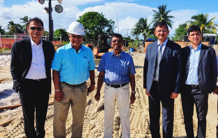 GWI Chief Executive Officer, Shaik Baksh (third from left) and Project Manager, Richard Persaud (second from left) with Toshiba Water Solutions Private Limited Director and Chief Executive Officer, Rajkumar Gupta ((second from right), Group Chief Financial Officer, Anil Chauhan (right) and Group Director, Sanjay Agrawal (left) at the project site yesterday.  (GWI photo)