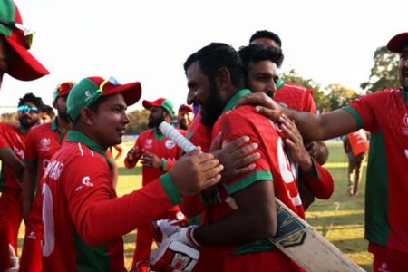 Oman?s cricketers celebrate their upset win over Ireland. (Photo courtesy ICC Twitter)
