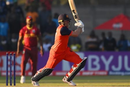 Logan van Beek walloped Jason Holder for three fours and as many sixes  •  ICC via Getty Images