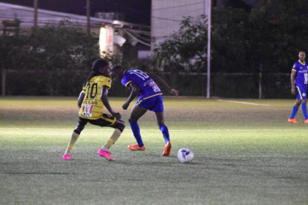 Andrew Murray (left/yellow) of Western Tigers skipping past his marker during his team’s clash with Victoria Kings in the Elite League