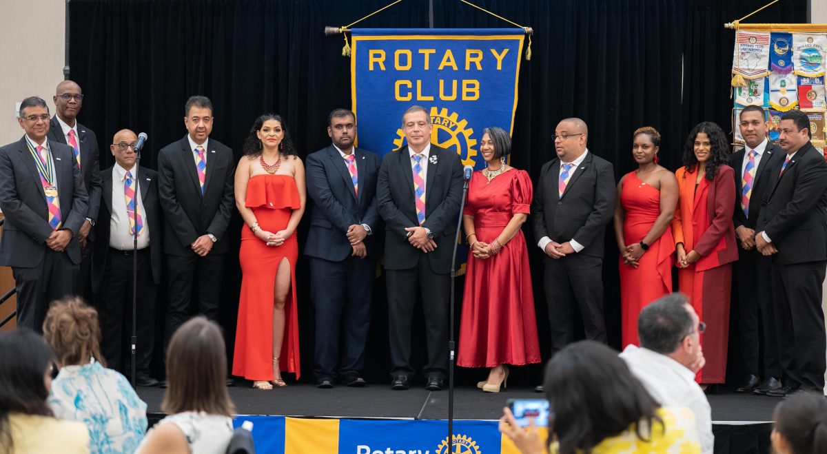 The new Rotary Club board. Devindra Kissoon is at left.