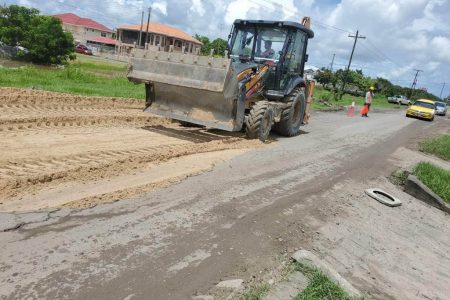 Maintenance work being done on the Ogle Airport access road. (Ministry of Public Works photo)