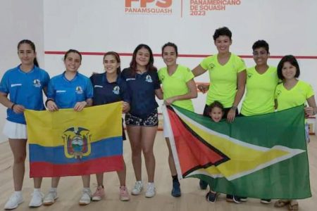 The Guyana men’s and women’s teams pose with the Argentine and Ecuadorian opponents after their matches.