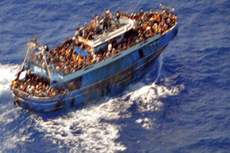 A undated handout photo provided by the Hellenic Coast Guard shows migrants onboard a boat during a rescue operation, before their boat capsized on the open sea, off Greece, June 14, 2023. Hellenic Coast Guard/Handout via REUTERS 