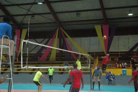 A scene from the Castrol Strikers (red) and Venguy clash in the Senior Men’s Volleyball League