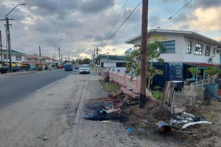 The scene of the accident showing the replaced utility pole
