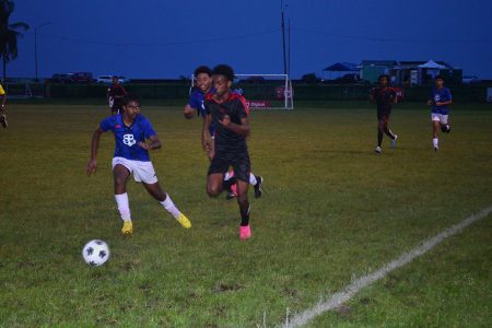 Excelsior’s Antonio MacArthur racing down the left flank against Marian Academy in the Digicel Schools Football Championship
