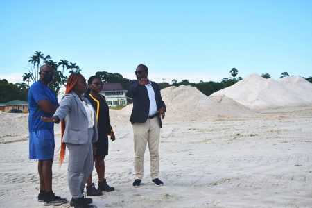 GFF President Wayne Forde (right) in discussions with McGregor’s Real Estate Development
representatives Tinisha Benn and Lisa Neils at
the Durban Park venue. Also in attendance was GFF 1st Vice-President Brigadier Bruce Lovell 