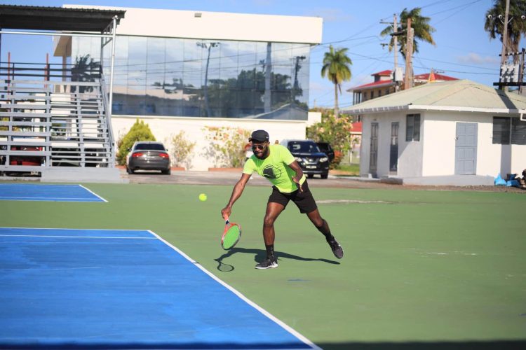 Gavin Lewis unleashing a forehand during his semi-final encounter against Seanden David-Longe in the Men’s Open division
