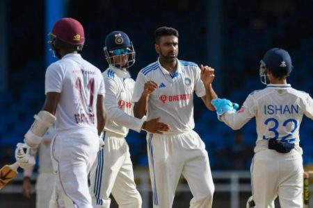 India’s Ravichandran Ashwin (centre) dismisses West Indies captain Kraigg Brathwaite in the 2nd Innings of the 2nd Test 