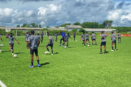 The Golden Jaguars U15 team conducting a passing drill during a
practice sessions at the National Training Centre, Providence 