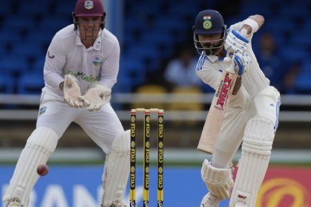 Virat Kohli drives down the ground during his unbeaten 87 to rescue India from a troubling situation at 182/4 in the 2nd Test against the West Indies
