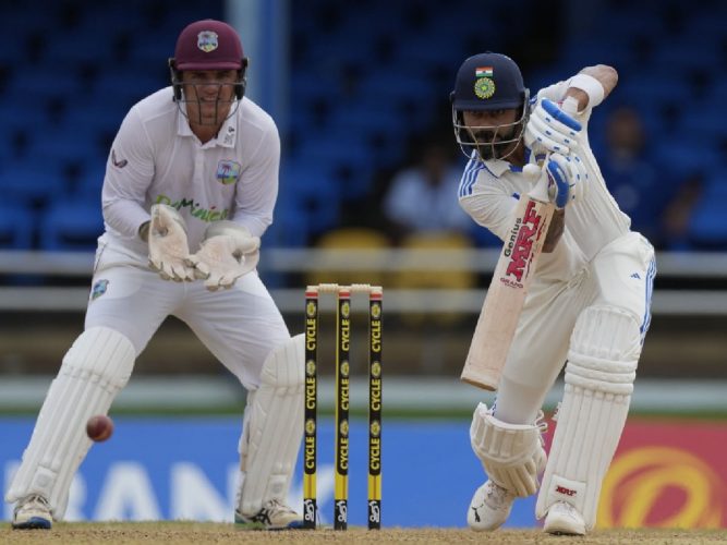 Virat Kohli drives down the ground during his unbeaten 87 to rescue India from a troubling situation at 182/4 in the 2nd Test against the West Indies
