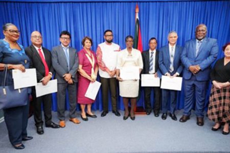 Despite objections from Opposition Leader Aubrey Norton to several of the newly-selected appointees to the Public Service Commission (PSC), President Irfaan Ali yesterday went ahead and swore in the members of the body.
The six commissioners who were administered their oath of office yesterday are Leila Ramson, Mohandatt Goolsarran, Manniram Prashad, Janice Bowen, Maurice Gajadhar, and Melcita Bovell. Prashad was elected chairman while Bovell was elected vice-chair at a meeting held immediately after the swearing-in.
The swearing-in ceremony took place at the Office of the President.
Ali told the newly sworn-in commissioners who will serve a term of three years, that he expects the PSC to work in the interest of the public sector and not just be a ceremonial body. He said that the commission’s appointments have come at a crucial time as the country pushes ahead with its transformation.
“It is to our benefit as a country and as a people that we not only hold public officers accountable… but very important in this process of transformation, that productivity and delivery become an important output of the public service,” the president was quoted as saying.
He charged the commissioners to work against slothful bureaucracy and work towards ensuring that every public entity is staffed with experienced and knowledgeable professionals.
While he declared that the commission will be free of political interference, he advised the commissioners to work with the government which in turn is working diligently to improve the livelihood, welfare, and quality of living for all Guyanese.
“The Government of Guyana recognises and respects the need for an independent and impartial Public Service Commission. The commission can be assured that there will be no political interference in the discharge of this mandate.”
Meanwhile, Norton in a missive to Ali dated June 23 and seen by this newspaper, registered his objection to the nominations of both Bovell and Ramson.
“In the case of Ms. Melcita Bovell and Mrs. Leila Ramson, they have a history of involvement in partisan politics or close links to a political party and or political party senior operatives. Consequently, I cannot support them being part of an Independent Public Service Commission,” he pointed out.
Acting on Norton’s behalf, attorney-at-law Roysdale Forde in a letter dated July 5, to Minister of Parliamentary Affairs and Governance, Gail Teixeira, declared the Leader of the Opposition’s objections as “an indisputable fact.” He noted that Ramson, is the wife of a former Attorney General and Minister of Legal Affairs in the People’s Progressive Party/Civic (PPP/C) administration and mother of the Minister of Culture, Youth and Sport, Charles Ramson, in the current PPP/C administration.
Regarding Bovell, Forde stated that she is “known to be a close associate of a senior political party operative which brings into question her ability to be independent.”
However, he signalled his support for Gajadhar as validated by his curriculum vitae and the fact that he is not a known political partisan and therefore had no issue in recommending him to be a part of the independent Public Service Commission.
Minister of Governance and Parliamentary Affairs, Gail Teixeira, however, rebutted Norton’s objections and noted that Bovell and Ramson have served Guyana with distinction.
Ramson, Teixeira argued, has served on the independent Teaching Service Commission established by the Constitution as a member thereof for 12 consecutive years commencing in 1994, and then served as Chairperson of the commission for another 10 years - all without legal challenge.
With respect to Bovell, Teixeira stated although an allegation of political association was made by Norton, no details were provided that would permit either an interrogation or a considered response.
But Forde on June 28, informed Teixeira that the consultation period was short and prevented the opposition from conducting any meaningful investigations into the candidates. This, he noted, renders the consultative process meaningless.
In response to these concerns, the minister informed Forde that President Ali has maintained that the trio proposed have provided distinguished public service to the nation as reflected in their curriculum vitae, and are persons of good standing. “In His Excellency’s opinion, they are qualified to serve as members of the Public Service Commission.”
