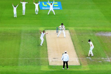 England's Mark Wood appeals successfully for the lbw wicket of Australia's Steve Smith Action Images via Reuters/Andrew Boyers