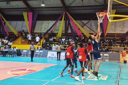Action between in the National School Basketball Festival between St. Stanislaus College and Vryman’s Erven at the National Gymnasium, Mandela Avenue
