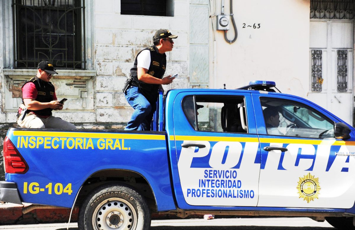 A police vehicle is seen as police officers and members of Guatemala's Attorney General's office raid the headquarters of the Guatemalan presidential candidate Bernardo Arevalo's Semilla party, a month before the run-off election, in Guatemala City, Guatemala July 21, 2023. REUTERS/Cristina Chiquin