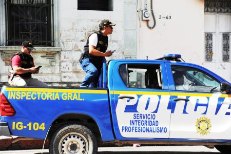 A police vehicle is seen as police officers and members of Guatemala's Attorney General's office raid the headquarters of the Guatemalan presidential candidate Bernardo Arevalo's Semilla party, a month before the run-off election, in Guatemala City, Guatemala July 21, 2023. REUTERS/Cristina Chiquin
