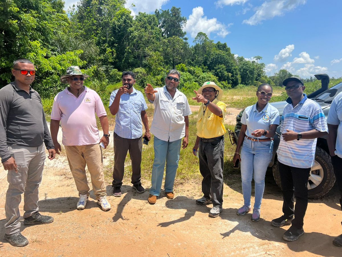 GWI CEO, Shaik Baksh (third from right) and Bartica Mayor, Anthony Murray (fourth from left) share their views on a potential location for a small treatment plant that will serve residents of Five Mile and the new Housing Scheme at Seven Mile, Bartica. (GWI photo)
