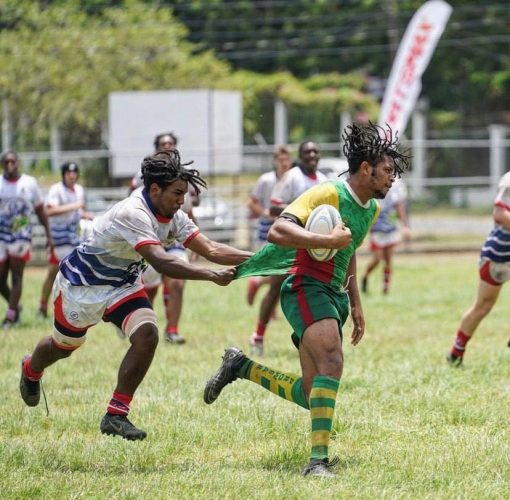 A scene from the Guyana/Cayman Islands ‘fifth place final’ yesterday at the Mona Campus ground in Jamaica. Guyana lost 0-52 in a matchup up of winless teams prior to the first whistle