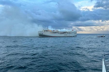 Smoke rises as a fire broke out on the cargo ship Fremantle Highway, at sea on July 26, 2023. Coastguard Netherlands/Handout via REUTERS