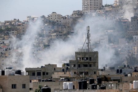 Smoke billows during an Israeli military operation in Jenin, West Bank, 03 July 2023. The Israel Defense Forces (IDF) announced on 03 July that they launched a large-scale operation in Jenin. According to the Palestinian Health Ministry, at least eight people were killed and dozens of others wounded in the Jenin raid, adding that the death toll was likely to rise. EPA-EFE/ALAA BADARNEH