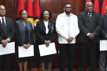 From left are DPP Shalimar Ali-Hack, BS Roy, Manniram Prashad, acting Chief Justice Roxane George, acting Chancellor of the Judiciary Yonette Cummings, President Irfaan Ali, Prime Minister Mark Phillips, retired Chancellor of the Judiciary Carl Singh, Attorney General Anil Nandlall and Minister of Parliamentary Affairs and Governance Gail Teixeira. (Department of Public Information photo)