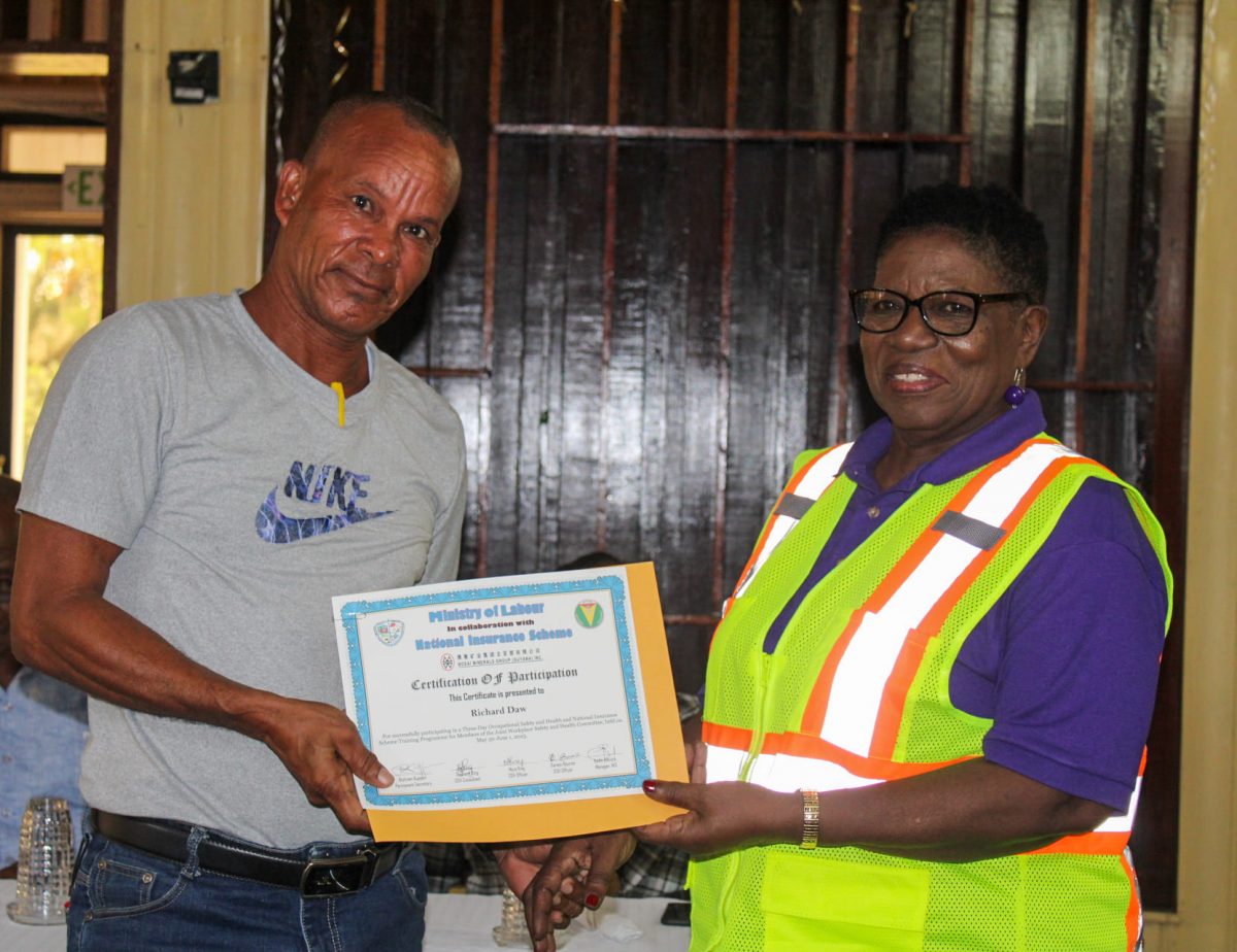 A certificate of participation being handed out