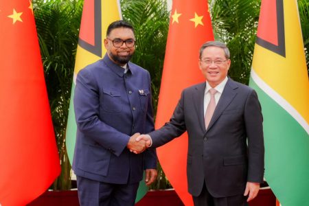 President Irfaan Ali (left) yesterday met with the Premier of the People’s Republic of China, Li Qiang, at the Great Hall of the People in Beijing.
The two leaders discussed several areas of cooperation and committed to strengthening bilateral ties. (Office of the President photo)