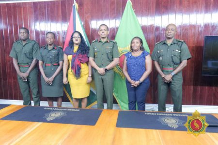 Brigadier Omar Khan (third from right) with GPA President Nazima Raghubir (fourth from right) and journalist Iva Wharton (second from right)