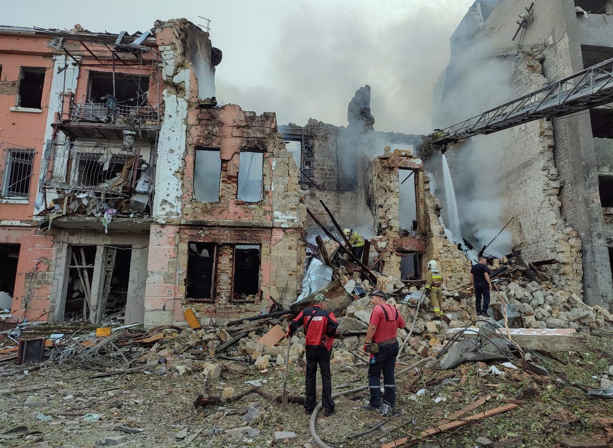 Rescuers work at a site of a residential building heavily damaged by a Russian missile attack, as Russia's attack on Ukraine continues, in Mykolaiv, Ukraine July 20, 2023. REUTERS/Viktoria Lakezina