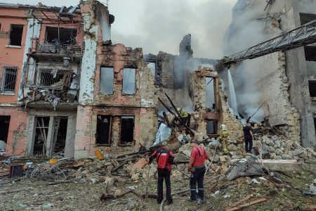 Rescuers work at a site of a residential building heavily damaged by a Russian missile attack, as Russia's attack on Ukraine continues, in Mykolaiv, Ukraine July 20, 2023. REUTERS/Viktoria Lakezina