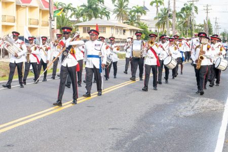 Ranks of the Guyana Police Force Band lead the force parade along Young Street during the wreath laying ceremony in observance of the Force 184th Anniversary (DPI Photo)