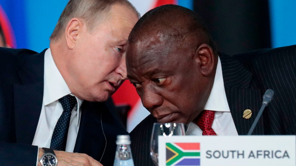 Vladimir Putin, left, and Cyril Ramaphosa. The South African president had faced a legal obligation to arrest the Russian president on an International Criminal Court indictment © AP 
