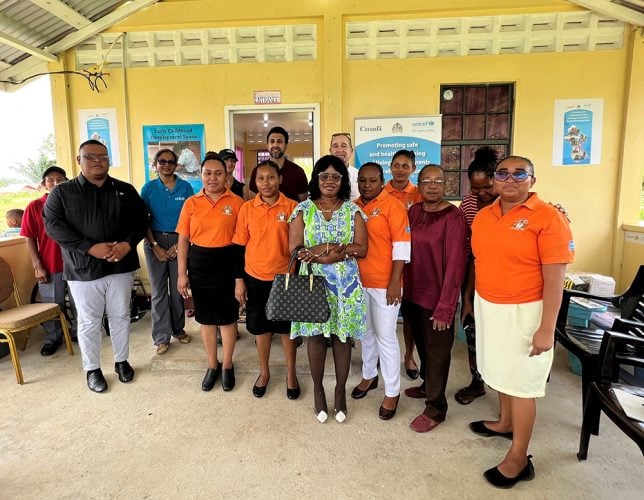 The Canadian delegation posing with regional officials, UNICEF representatives, Community Health Workers and parents at the Khans Hill’s Health Post where one of the Early Childhood Development corners is located. (UNICEF photo)
