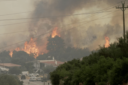 A wildfire burns near the village of Agios Sotira, west of Athens, Greece, July 20, 2023. Photo via Reuters.