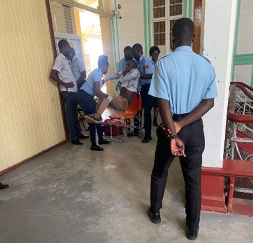 Wesley Bazil being placed onto a stretcher by the EMTs after collapsing upon learning that he had been found guilty of rape