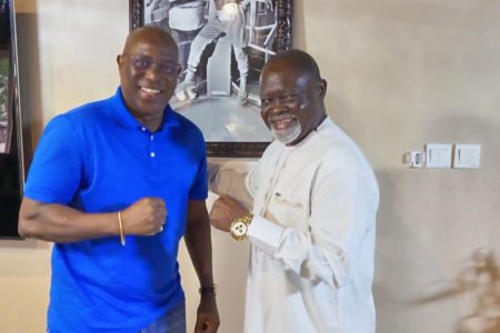 President of the Guyana Boxing  Association (GBA), Steve Ninvalle (left) yesterday was in the corner of boxing great and former world featherweight and super featherweight champion, Azumah Nelson. 