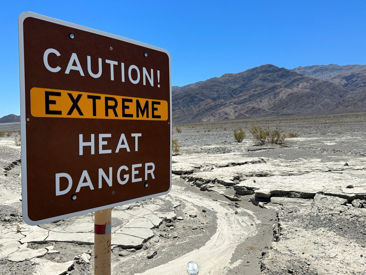 FILE PHOTO: A view of sign board warning of extreme heat in Death Valley, California, U.S. July 15, 2023. REUTERS/Jorge Garcia/File Photo