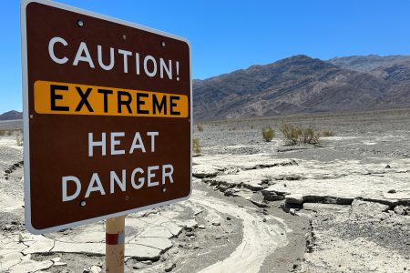 FILE PHOTO: A view of sign board warning of extreme heat in Death Valley, California, U.S. July 15, 2023. REUTERS/Jorge Garcia/File Photo