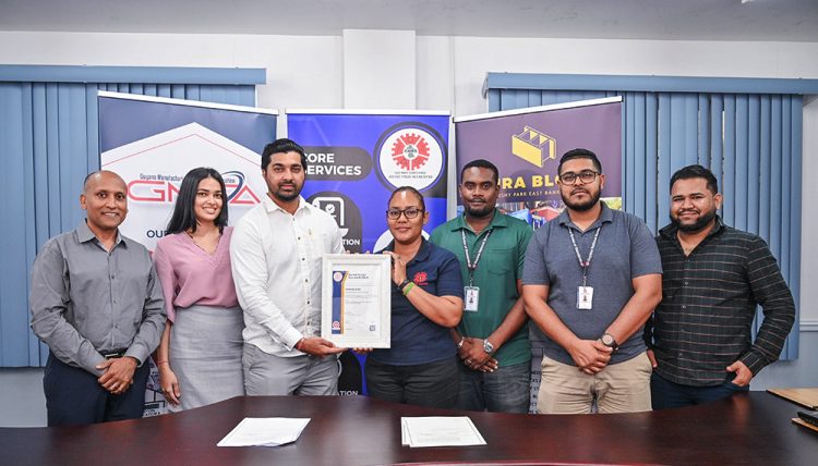 Vinash Chand (third from left) receiving his certification. (GNBS photo)