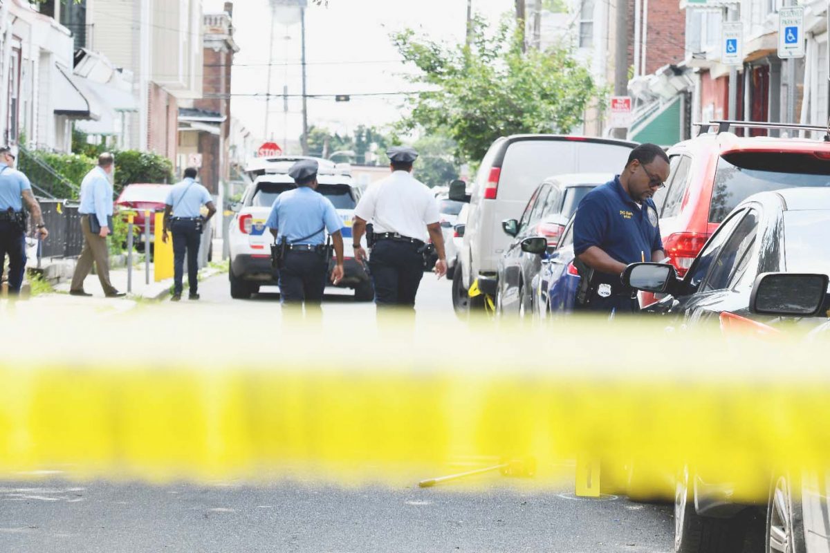 Police officers work at the scene as investigations are ongoing the day after a mass shooting in the Kingsessing section of southwest Philadelphia, Pennsylvania, U.S. July 4, 2023. REUTERS/Bastiaan Slabbers