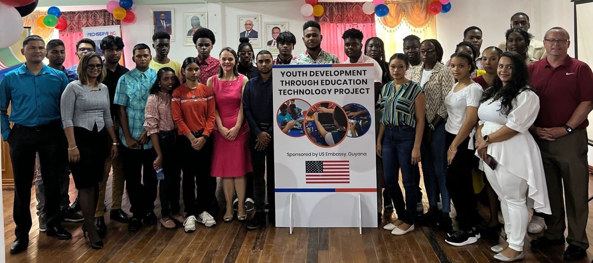 US Embassy officials with the youths being trained. Jai Hirai is at left (US Embassy photo)